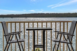 Picture yourself sipping morning coffee at your private waterside perch, where sparkling lake views and gentle breezes create the perfect escape. Your tranquil retreat awaits. - Waterfront on the Balcony! Heated Pool & Hot Tub (St. Petersburg)