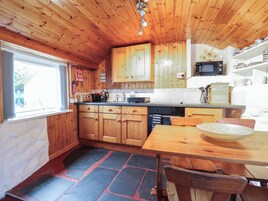 Fridge, electric kettle, toaster, cookware/dishes/utensils