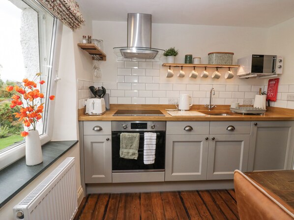 Fridge, electric kettle, toaster, cookware/dishes/utensils