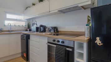 Fridge, dishwasher, electric kettle, cookware/dishes/utensils
