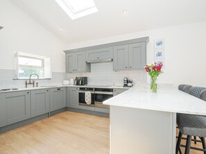 Fridge, dishwasher, cookware/dishes/utensils