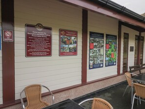 A wall with informational signs and a no smoking sign. - Dalegarth Hall Farm Cottage 2 (Holmrook)