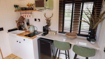 Fridge, electric kettle, toaster, cookware/dishes/utensils