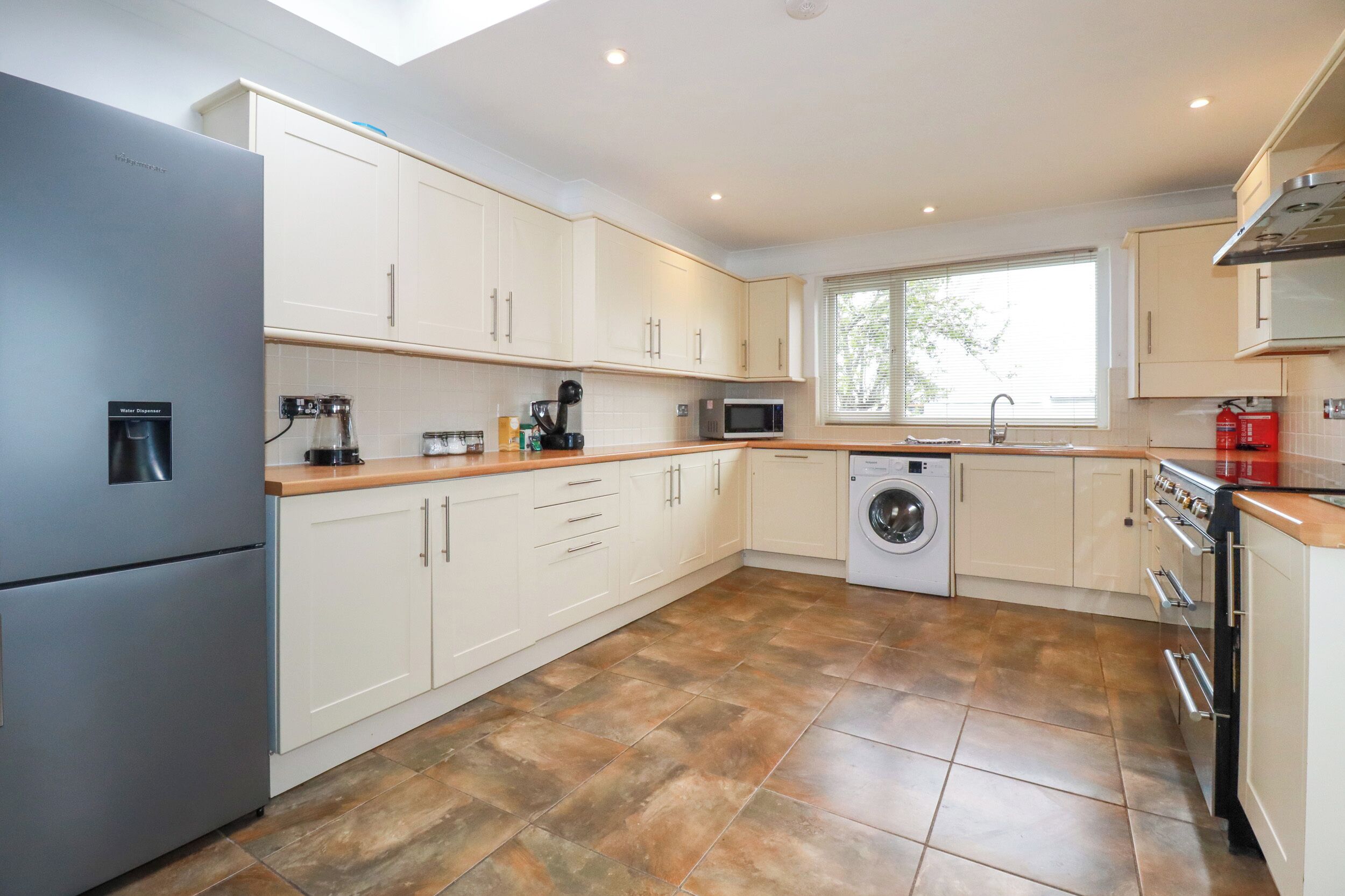 Fridge, dishwasher, electric kettle, cookware/dishes/utensils