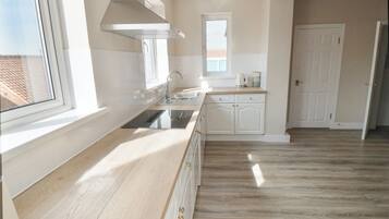 Fridge, dishwasher, cookware/dishes/utensils