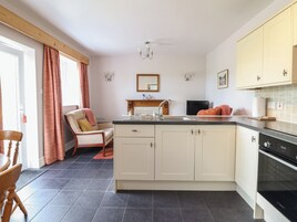 Fridge, electric kettle, toaster, cookware/dishes/utensils