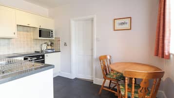 Fridge, electric kettle, toaster, cookware/dishes/utensils