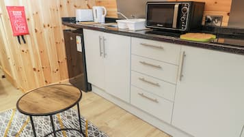 Fridge, electric kettle, toaster, cookware/dishes/utensils