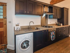 Fridge, electric kettle, cookware/dishes/utensils