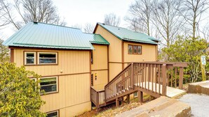 A two-story building with a green roof and wooden exterior. - Hike, Sip & Stay Awhile! Sugar Mountain Getaway (Banner Elk)