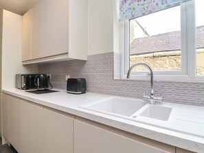 Fridge, dishwasher, toaster, cookware/dishes/utensils