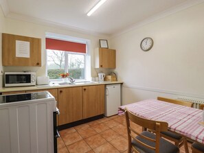 Fridge, electric kettle, toaster, cookware/dishes/utensils