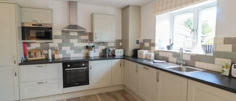 Fridge, electric kettle, toaster, cookware/dishes/utensils