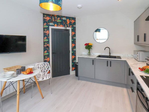 Fridge, electric kettle, toaster, cookware/dishes/utensils