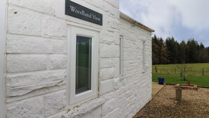 A white brick building with a sign reading "Woodland View." - Woodland View (Bishop Auckland)