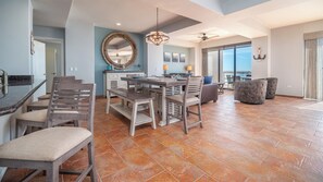 Enjoy a spacious interior with a dining area, seating area, and ocean view.