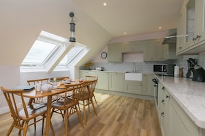 Fridge, dishwasher, electric kettle, cookware/dishes/utensils