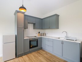 Fridge, electric kettle, toaster, cookware/dishes/utensils