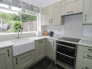 Fridge, dishwasher, electric kettle, cookware/dishes/utensils
