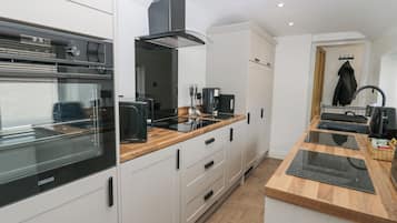 Fridge, electric kettle, toaster, cookware/dishes/utensils