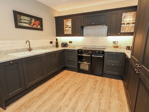 Fridge, dishwasher, toaster, cookware/dishes/utensils