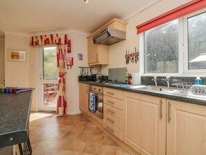 Fridge, electric kettle, cookware/dishes/utensils