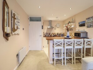 Fridge, electric kettle, toaster, cookware/dishes/utensils