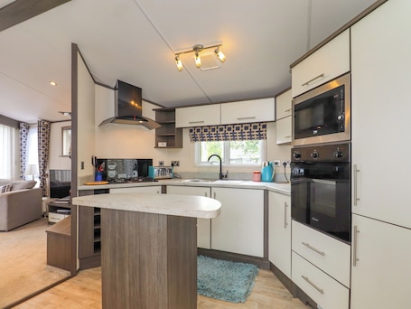 Fridge, electric kettle, toaster, cookware/dishes/utensils