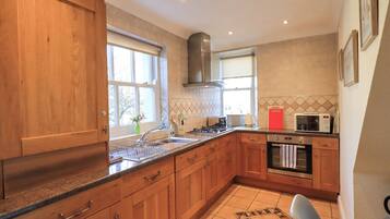 Fridge, dishwasher, cookware/dishes/utensils