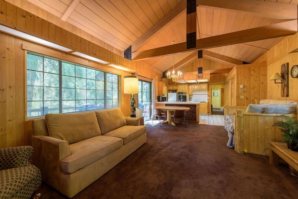 Stream on the living room’s smart TV or catch a nap on the twin daybed/trundle combo