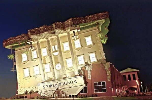 A large building with a sign that reads 'WonderWorks.'