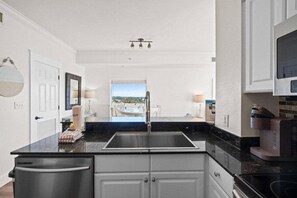 Microwave, stovetop, dishwasher, coffee/tea maker