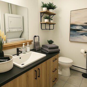 Hair dryer, towels, soap, shampoo