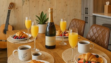 Enjoy a leisurely breakfast in this inviting dining area, complete with a beautifully set table and a warm, natural ambiance.