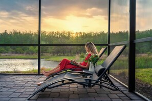 Terrace/patio - Luxury 9BR Gem: Heated Pool, Theater & Theme Rooms (Kissimmee)