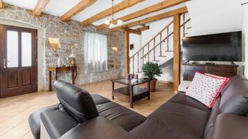 House, Private Pool | Living area | 100-cm flat-screen TV with satellite channels