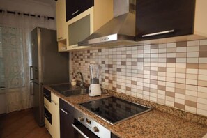 Apartment, Balcony | Private kitchen | Fridge, electric kettle