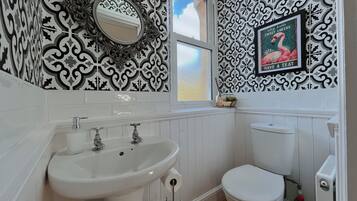 Shower, eco-friendly toiletries, hair dryer, towels