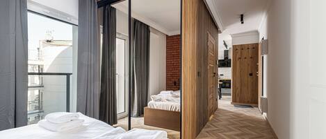 Apartamento, sacada | 1 quarto, ferros/tábuas de passar roupa, Wi-Fi de cortesia