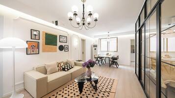 Condo, vista a la ciudad | Área de sala de estar