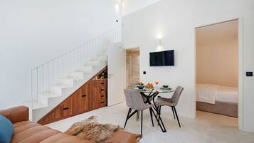 Comfort Duplex, 2 Bedrooms, Non Smoking | Living area | 32-inch flat-screen TV with satellite channels