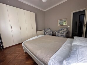 Family Apartment, 1 Bedroom | 1 bedroom, iron/ironing board, free WiFi - Suite D'Annunzio (Ravenna)