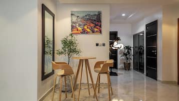 Executive Apartment, 2 Bedrooms, Non Smoking, City View | Living room | 50-inch Smart TV with cable channels, Netflix, streaming services