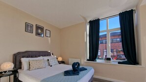 2 habitaciones, tabla de planchar con plancha, wifi y ropa de cama 