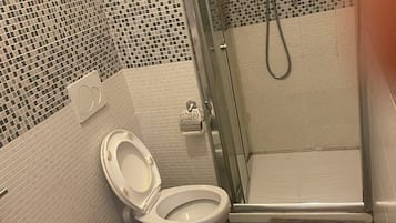 Bathtub, hair dryer, towels, soap