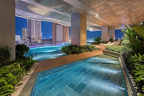 Outdoor pool, open 7:00 AM to 6:00 PM, pool umbrellas, sun loungers