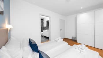 2 slaapkamers, een strijkplank/strijkijzer, beddengoed, rolstoeltoegang