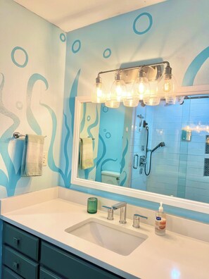 Shower, towels, soap, toilet paper