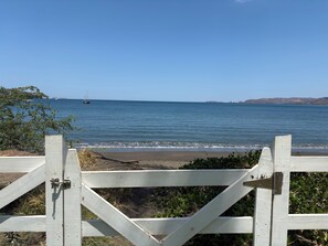 On the beach, sun loungers, beach towels - 37 steps to Playa Potrero from the back door. Pool, Sleeps 6! Sunsets galore! (Guanacaste Province)