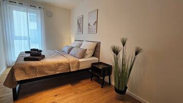 2 bedrooms, desk, iron/ironing board, travel cot